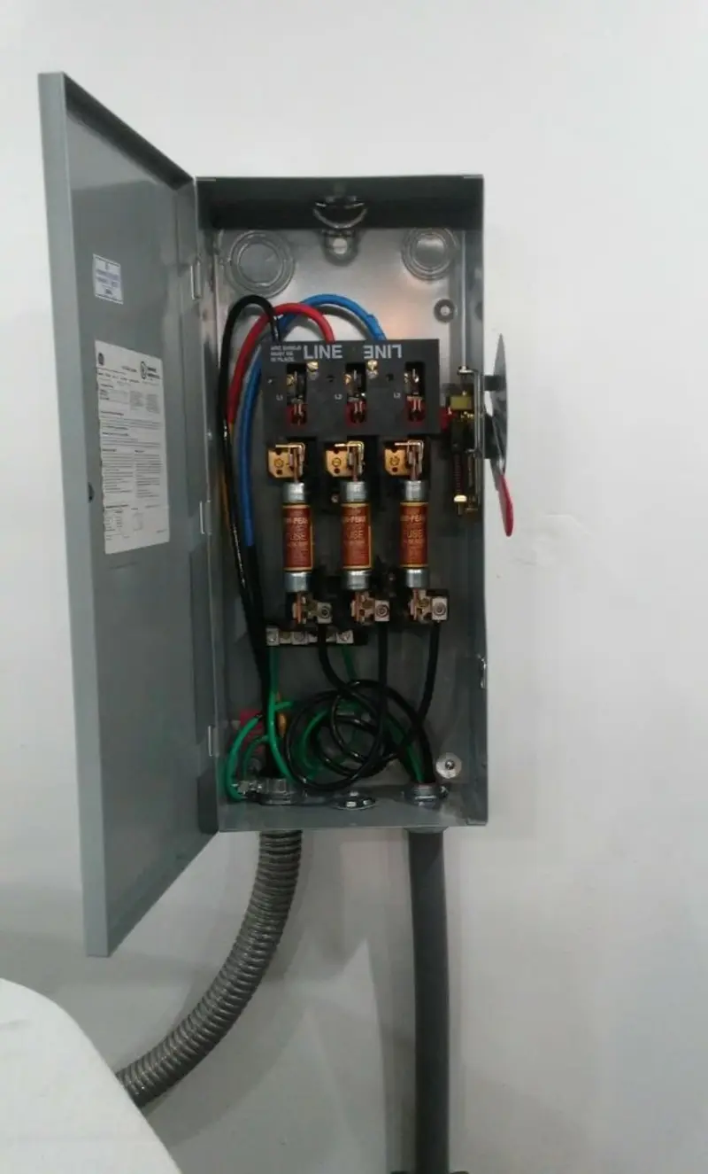 Three-phase disconnect switch installed for Smoke Detector Installation in Wright